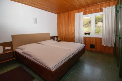 Ein Bett oder Betten in einem Zimmer der Unterkunft Ferienhauser Siefertshof
