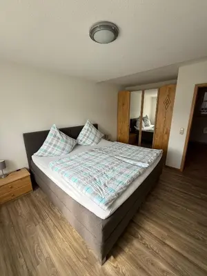 Ein Bett oder Betten in einem Zimmer der Unterkunft Haus am Mühlberg