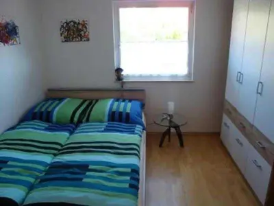 Ein Bett oder Betten in einem Zimmer der Unterkunft Ferienwohnung Schlossblick