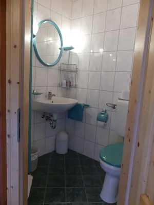 Ein Badezimmer in der Unterkunft Pension Holzerstube