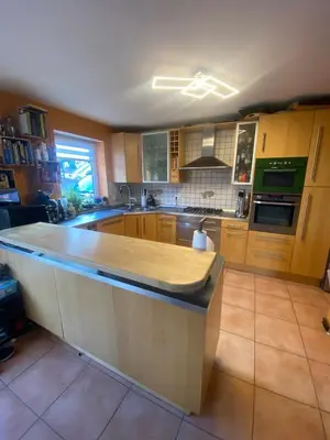 Küche/Küchenzeile in der Unterkunft Ferienhaus am Waldrand Village Holiday home