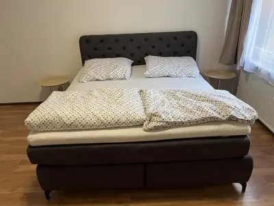 Ein Bett oder Betten in einem Zimmer der Unterkunft Schöne Maisonette 4 Zimmer mit Garten