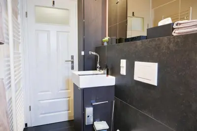 Ein Badezimmer in der Unterkunft LUI Guesthouse - BohoStyle