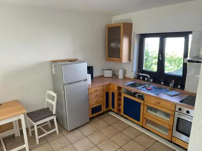 Küche/Küchenzeile in der Unterkunft Gemütliches Apartment in Erzhausen, südliches Rhein-Main-Gebiet