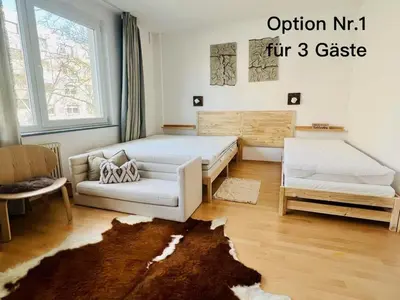 Ein Bett oder Betten in einem Zimmer der Unterkunft UrbanPause Studio KA-Mitte