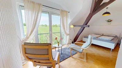 Ein Bett oder Betten in einem Zimmer der Unterkunft Ferienhaus im Weinberg Kallstadt