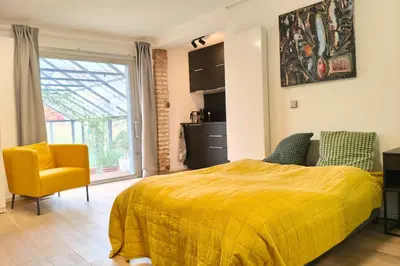 Ein Bett oder Betten in einem Zimmer der Unterkunft ZEN Loft - Küche - Terrasse - perfekte Anbindung