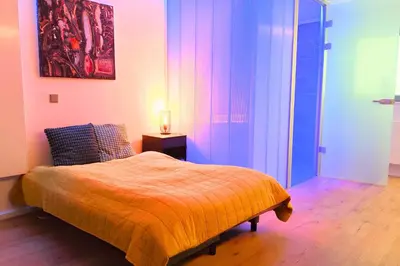Ein Bett oder Betten in einem Zimmer der Unterkunft ZEN Loft - Küche - Terrasse - perfekte Anbindung