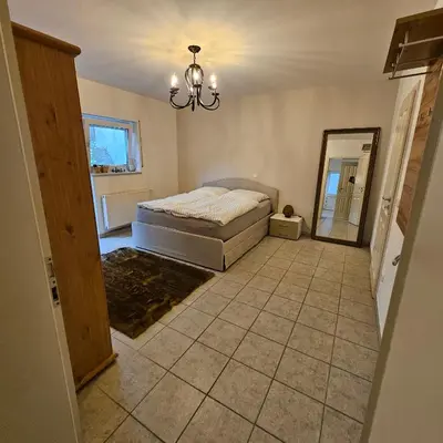 Ein Bett oder Betten in einem Zimmer der Unterkunft Komplette Ferienwohnung für bis zu 4 Personen