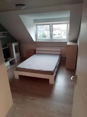 Ein Bett oder Betten in einem Zimmer der Unterkunft 2-Zimmerwohnung in Durlach