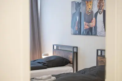 Ein Bett oder Betten in einem Zimmer der Unterkunft PF01 Innenstadt Apartment - NEU Monteurunterkünfte in Pforzheim - LS CrewComfort auch für weitere Unterkünfte