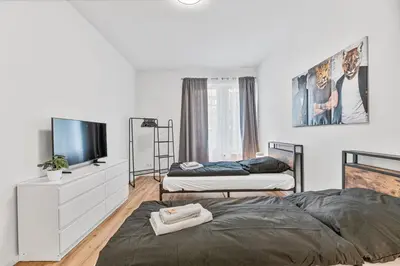Ein Bett oder Betten in einem Zimmer der Unterkunft PF01 Innenstadt Apartment - NEU Monteurunterkünfte in Pforzheim - LS CrewComfort auch für weitere Unterkünfte