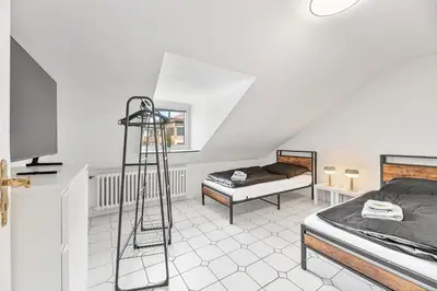 Ein Bett oder Betten in einem Zimmer der Unterkunft PF03 Innenstadt Apartment für Monteure und Teams - NEU Monteurunterkünfte in Pforzheim - LS CrewComfort auch für weitere Unterkünfte