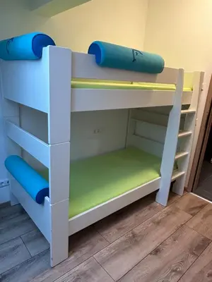 Ein Etagenbett oder Etagenbetten in einem Zimmer der Unterkunft Gemütliche 3 Zimmer zum Entspannen
