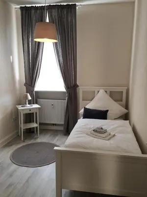 Ein Bett oder Betten in einem Zimmer der Unterkunft Bärengasse Apartments