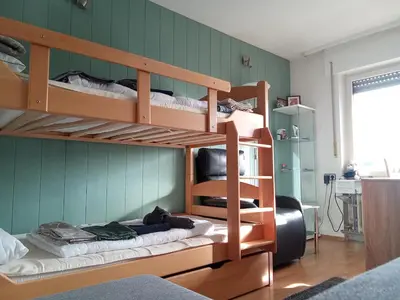 Ein Bett oder Betten in einem Zimmer der Unterkunft Komplette Wohnung Schwarzwaldpforte Casa BaLi direkte Buchung möglich keine Freigabe mehr erforderlich