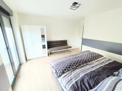 Ein Bett oder Betten in einem Zimmer der Unterkunft 26K, Luxus Apartments