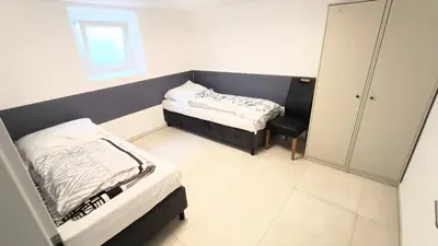 Ein Bett oder Betten in einem Zimmer der Unterkunft 26K, Luxus Apartments