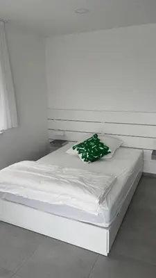 Ein Bett oder Betten in einem Zimmer der Unterkunft Boardinghouse Living