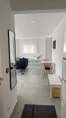 Ein Sitzbereich in der Unterkunft Boardinghouse Living