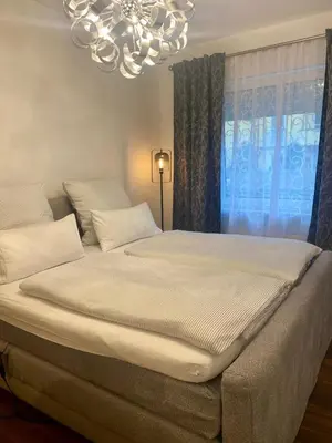 Ein Bett oder Betten in einem Zimmer der Unterkunft Ferienwohnung