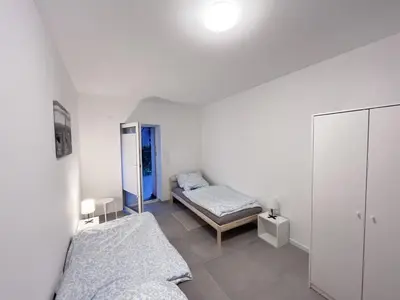 Ein Bett oder Betten in einem Zimmer der Unterkunft Modern and Cozy Apartment in Heilbronn