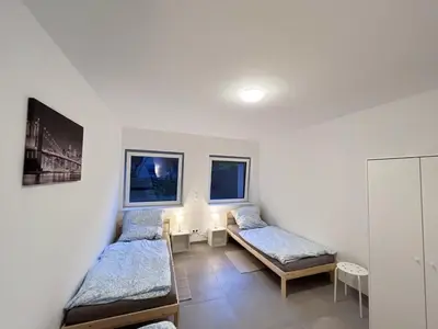 Ein Bett oder Betten in einem Zimmer der Unterkunft Modern and Cozy Apartment in Heilbronn