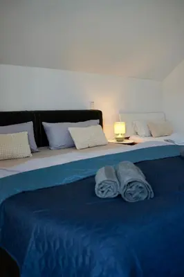 Ein Bett oder Betten in einem Zimmer der Unterkunft PrimeBnb Schönbrunn