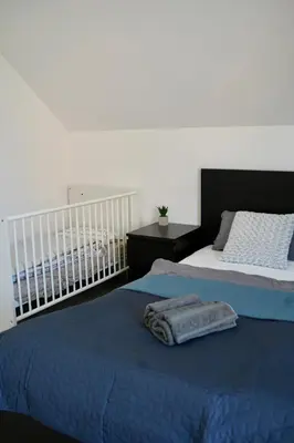 Ein Bett oder Betten in einem Zimmer der Unterkunft PrimeBnb Schönbrunn