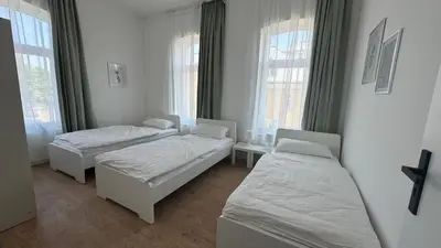 Ein Bett oder Betten in einem Zimmer der Unterkunft Böhl Station Appartments