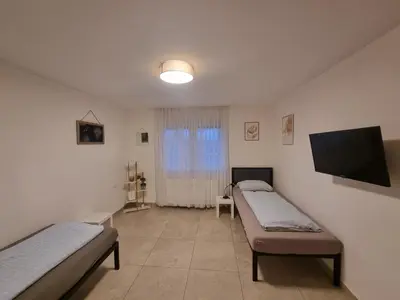 Ein Bett oder Betten in einem Zimmer der Unterkunft Residence Apartments