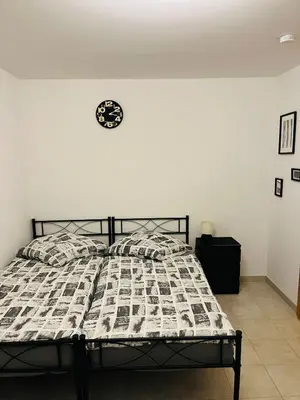 Ein Bett oder Betten in einem Zimmer der Unterkunft Tanjas Home