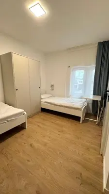 Ein Bett oder Betten in einem Zimmer der Unterkunft Böhl Station 1 Zimmer-Wohnungen