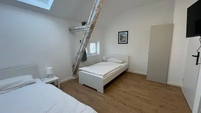 Ein Bett oder Betten in einem Zimmer der Unterkunft Böhl Station WHG 7