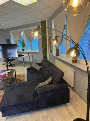 Ein Sitzbereich in der Unterkunft Stilvolles & klimatisiertes Loft mit Ausblick in die Ferne