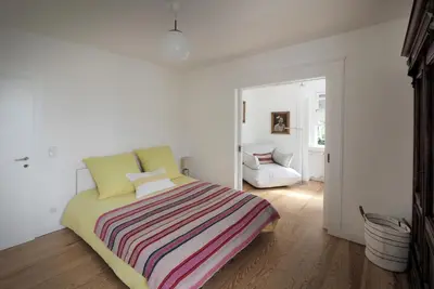 Ein Bett oder Betten in einem Zimmer der Unterkunft Ferienwohnung am Park
