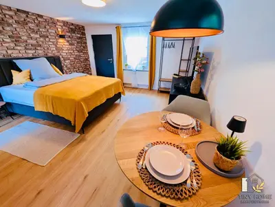 Ein Bett oder Betten in einem Zimmer der Unterkunft Tiny Home Lampertheim