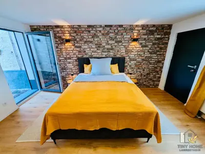 Ein Bett oder Betten in einem Zimmer der Unterkunft Tiny Home Lampertheim