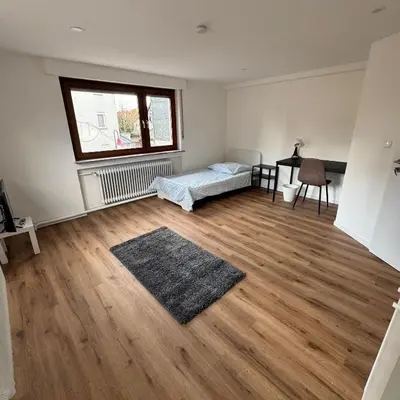 Ein Bett oder Betten in einem Zimmer der Unterkunft Monteurzimmer Wohnung in Heilbronn und Umgebung