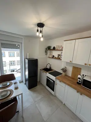 Küche/Küchenzeile in der Unterkunft Gemütliches Apartment I Mitten in der Stadt Aschaffenburg I 5 Min HBF I Gegenüber City Galerie