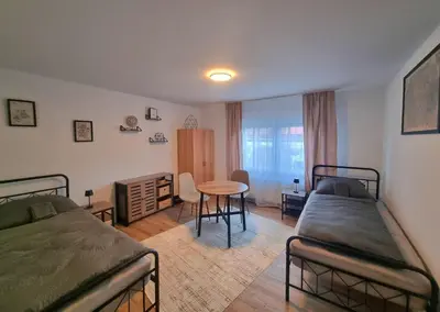Ein Bett oder Betten in einem Zimmer der Unterkunft Residence Apartments