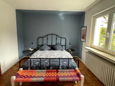 Ein Bett oder Betten in einem Zimmer der Unterkunft Das Grüne Nest