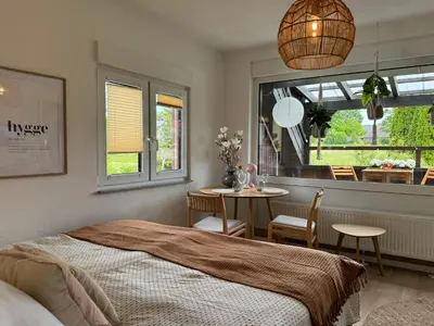 Ein Bett oder Betten in einem Zimmer der Unterkunft SchwarzwaldQuartier Dobel