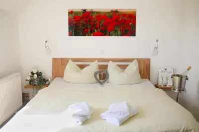 Ein Bett oder Betten in einem Zimmer der Unterkunft Hotel Duwakschopp