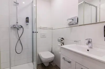 Ein Badezimmer in der Unterkunft Nine Rooms - Serviced Rooms