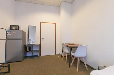 Küche/Küchenzeile in der Unterkunft G-Living Wilhelmstraße