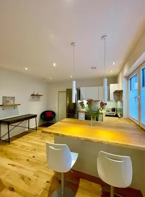 Ein Sitzbereich in der Unterkunft Moderne gemütliche Wohnung - zentral und naturnah