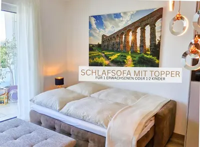 Ein Bett oder Betten in einem Zimmer der Unterkunft Balkon-Parken-Self-Check-in-Limes2Living-Niedernberg