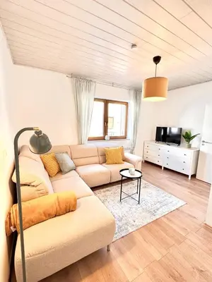 Ein Sitzbereich in der Unterkunft Ferienwohnung in Lorsch mit Garten