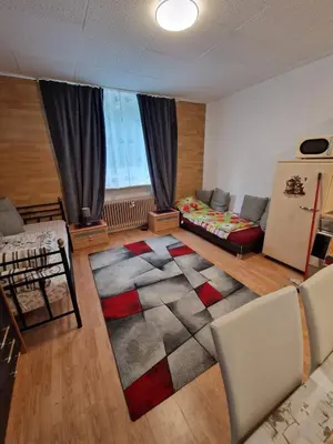 Ein Sitzbereich in der Unterkunft quiet apartment